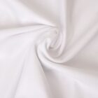 White fabric with a swirling texture, creating a spiral pattern in the center.