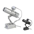 Two silver and black LED spotlights on adjustable mounts, with cooling fins and cables.