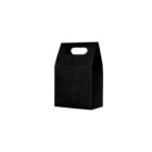 Black paper bag with a handle against a white background.