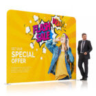 Man in suit stands beside a large Flash Sale sign with a colorful design.