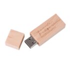 Wooden USB drive with cap removed, displaying a carved design and Photography text.