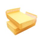 Stack of promotional yellow padded envelopes with peel-and-seal strips.