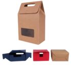 Four cardboard boxes, one tall with a handle, others flat in blue, red, and brown.
