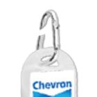 Close-up of a keychain with a Chevron logo and a metal key ring attached.