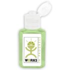 Small bottle of green hand sanitizer labeled WORKS IN PROGRESS with an abstract logo.