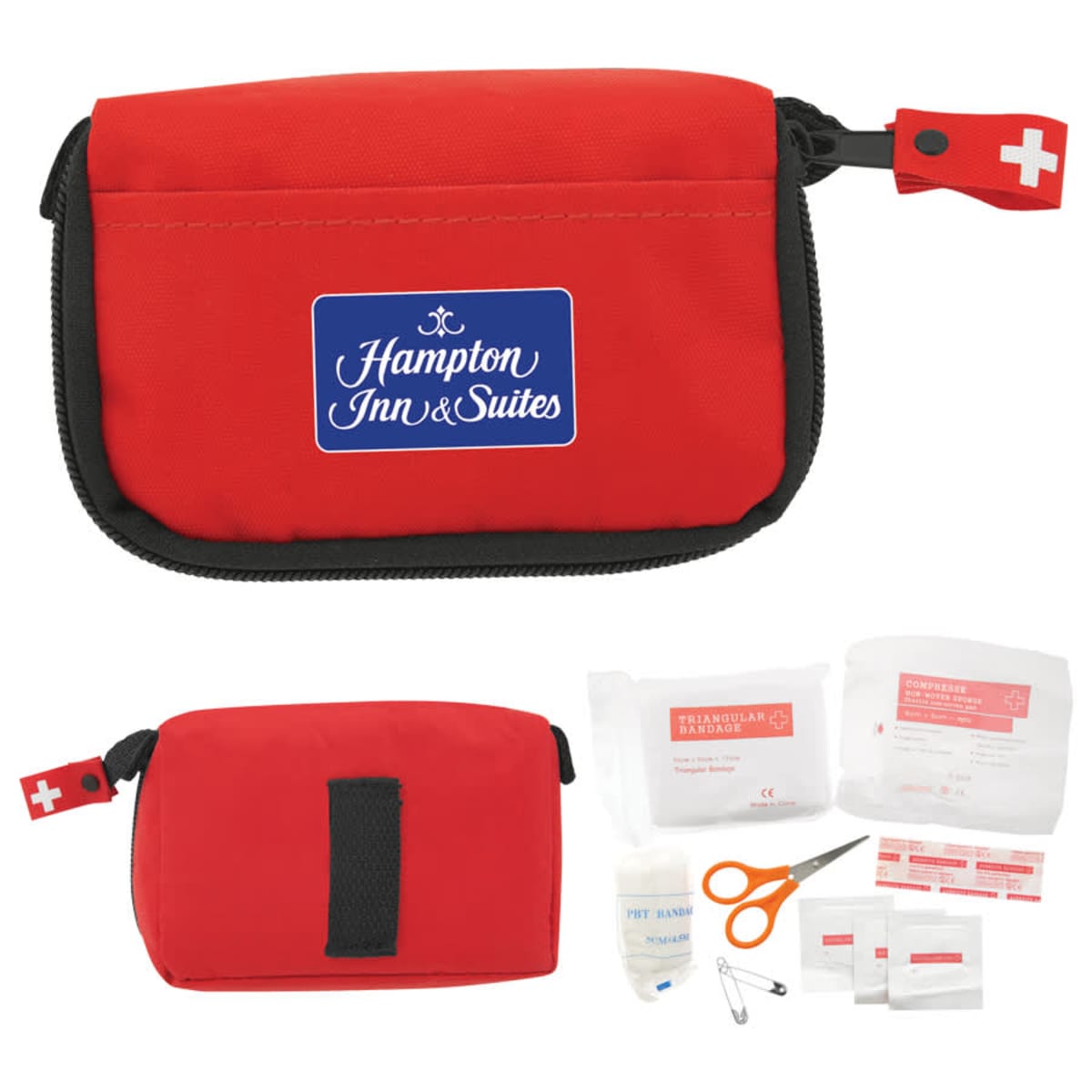 Red first aid kit with supplies, labeled Hampton Inn & Suites.