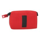 Red first aid pouch with black zipper and Swiss cross tag.