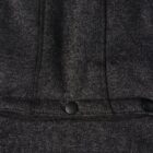 Close-up of a dark gray knit fabric with black buttons.