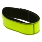 A reflective yellow armband with a black inner lining and a Velcro closure.