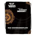 Black drawstring bag with bold white text promoting Countercurrents.org and orange gear designs.