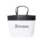 White and black tote bag with MOTORBIKE text and logo.