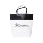 White and black tote bag with MOTORBIKE SPORT LOGO design on front.