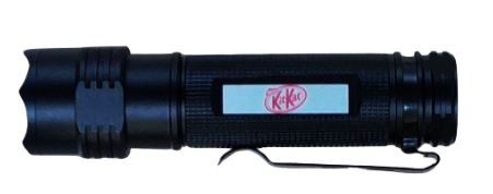A black flashlight with a Kit Kat logo on its body, featuring a clip on the side.