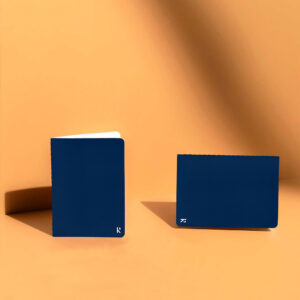 A colorful promotional notebook with a logo on the cover.