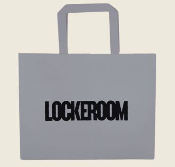 branded paper bag with LOCKERROOM printed in bold black letters.