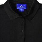 Black polo shirt with a blue label under the collar.