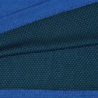 Close-up of blue fabric with textured and dotted patterns.