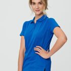 Person in a blue polo shirt poses confidently against a plain background.