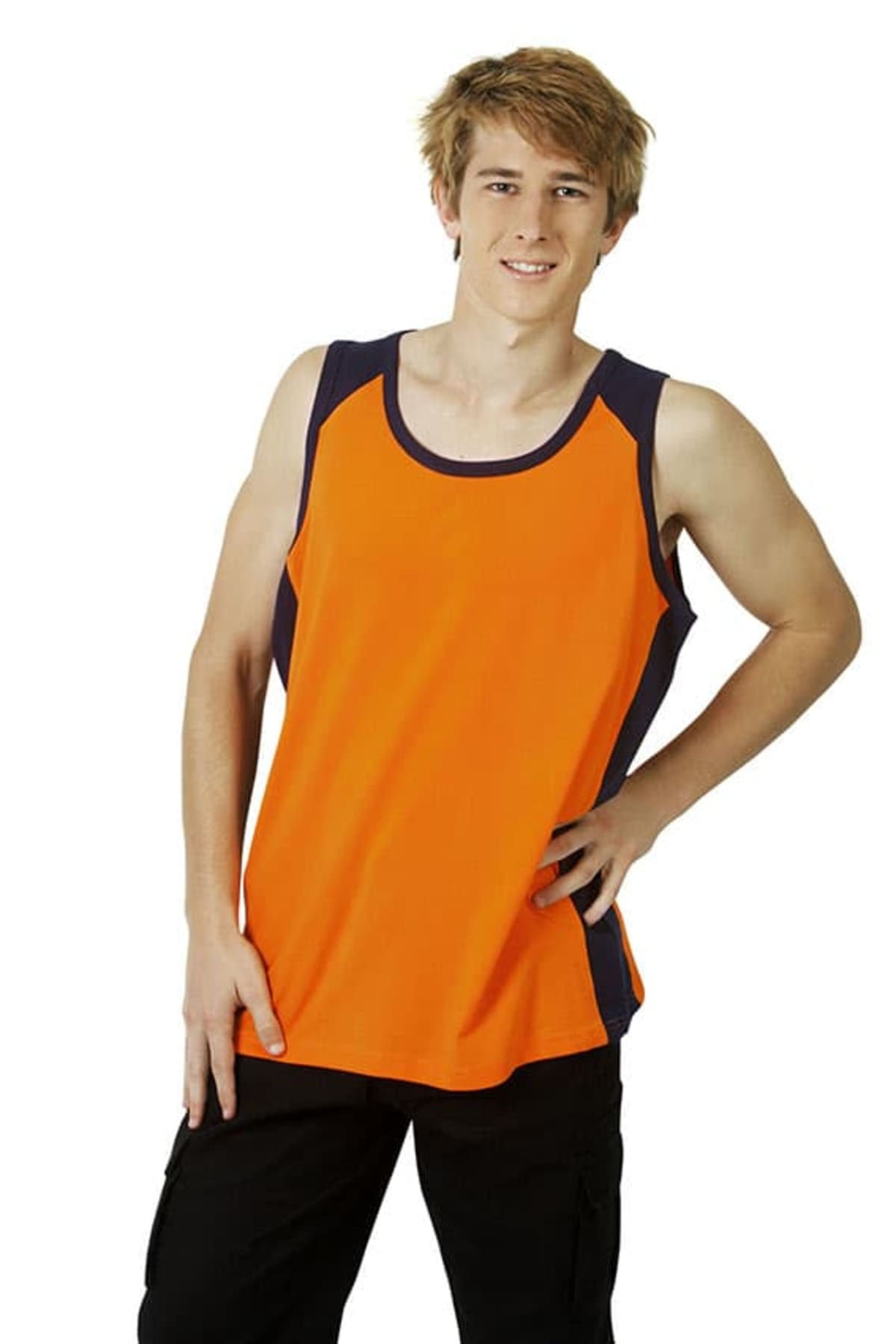 Young man in an orange and black tank top posing with one hand on his hip, smiling.
