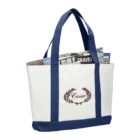 White and blue tote bag with newspapers inside.