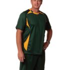 Man in green and yellow athletic outfit standing against a white background.