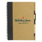 Spiral-bound notebook with Holiday Inn Select logo and attached pen on the side.