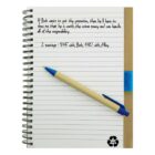 Open notebook with handwritten notes, a blue pen placed on top.