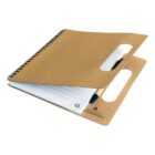 A brown spiral notebook with a pen and a handle cutout in the cover.