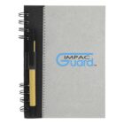 Gray spiral notebook with IMPAC Guard logo and attached pen on the left side.
