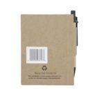 A notebook with a brown recycled cardboard cover. A barcode is visible on the back, along with text stating the cover, pages, and pen are made of recycled materials. A black pen is clipped to the right side.