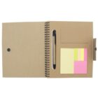 An open spiral notebook with a black pen in a holder. It features sticky notes in yellow, pink, and green on the right side. The notebook has a brown cover and a simple black button closure.