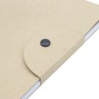 Close-up of a brown kraft paper envelope with a rounded flap secured by a black button. The envelope is on a white background, slightly open at the side, revealing some white papers inside.