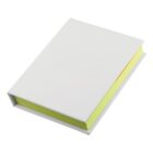Closed white book with a bright yellow page edge, viewed from a side angle.