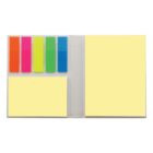 Open notebook with sticky note tabs in various colors and yellow note pads.