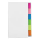 A white cover notebook with colorful sticky notes peeking out from the side.