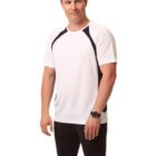 Man in white T-shirt and black shorts smiling against a white background.