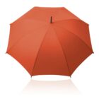 Orange umbrella fully opened, viewed from above on a white background.