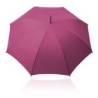 A pink umbrella fully opened, viewed from above against a white background.