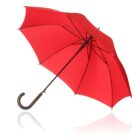 A red umbrella with a curved black handle on a white background.