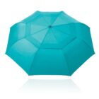 A teal umbrella fully open, viewed from above against a white background.