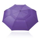 Purple umbrella fully opened against a white background.