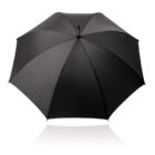 Black umbrella fully opened, viewed from above against a white background.
