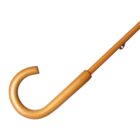A wooden walking cane with a curved handle on a white background.