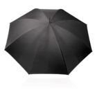 A fully opened black umbrella against a white background, showing its top view with multiple radial panels converging at the center.