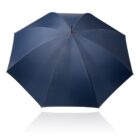 A navy blue umbrella with a simple, rounded design is open against a white background. The metal tip is visible at the top center, and the umbrella casts a faint shadow below.