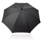 A large black umbrella opened against a white background.