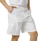Person wearing white cargo shorts and a white t-shirt with hands in pockets.
