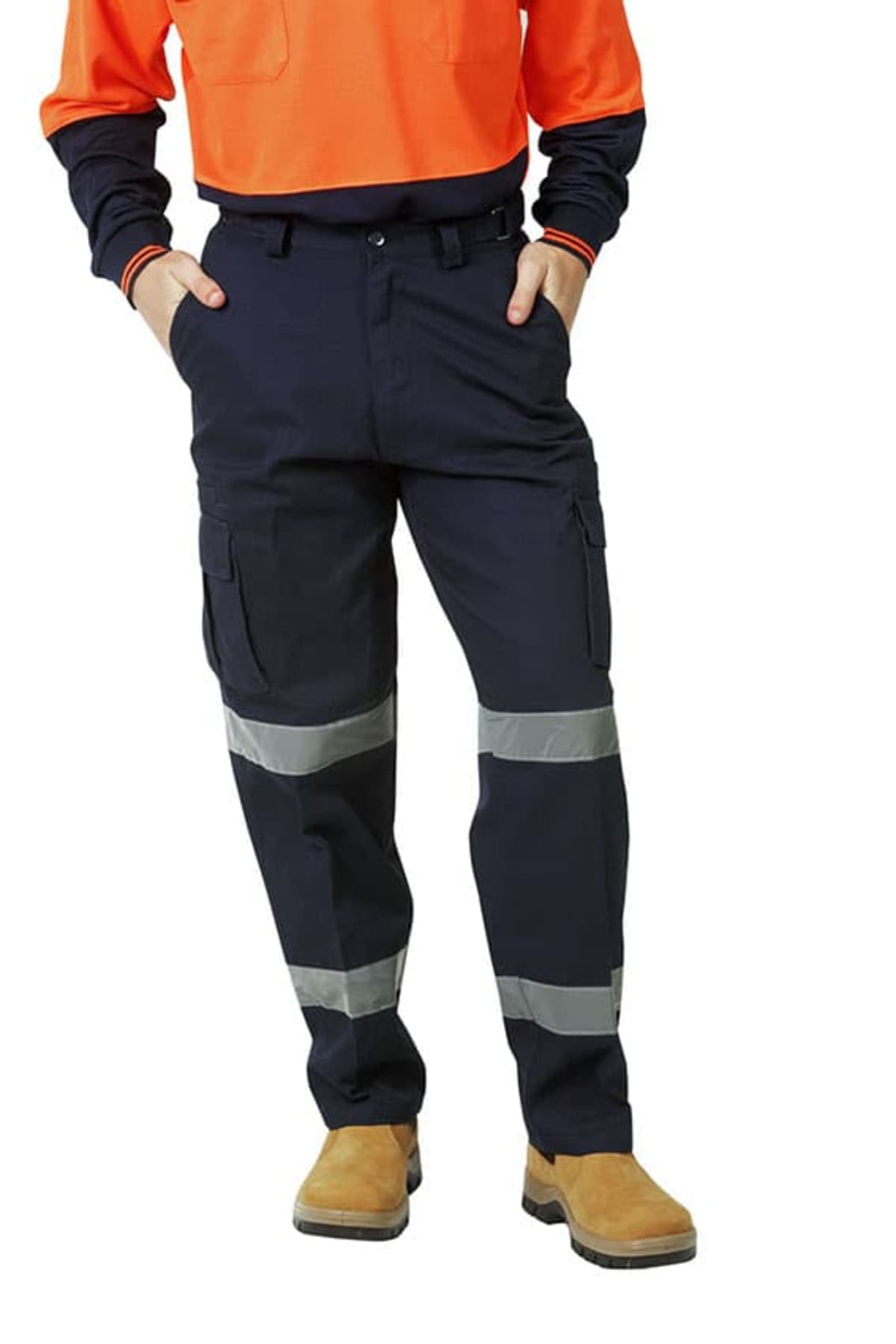 Person wearing navy cargo pants with reflective bands, orange top, and brown work boots.