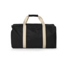 Black duffel bag with beige handles on a white background.