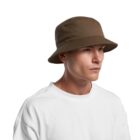 Man wearing a brown bucket hat and a white shirt against a white background.